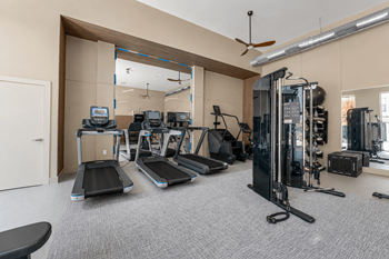 Fitness room with cardio and strength training equipment